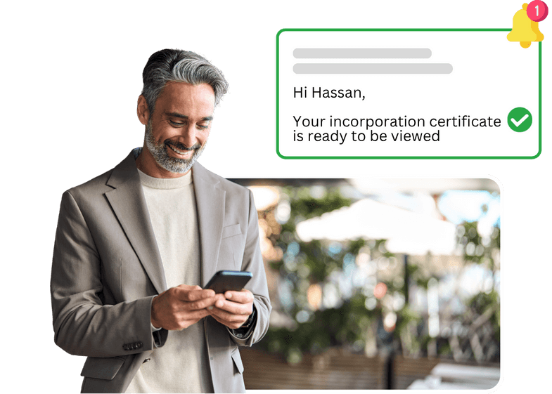 Smiling foreign entrepreneur checking UK company incorporation update on phone with notification message powered by Online Filings