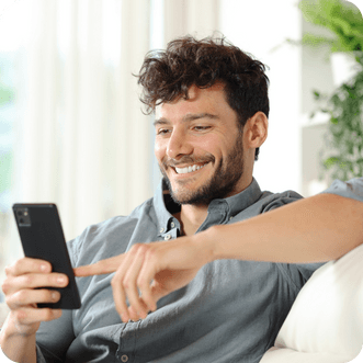 Smiling non-resident entrepreneur registering a UK company  using Online Filings platform