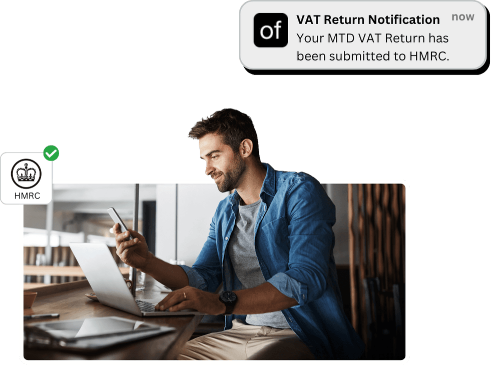 Smiling business owner checking phone next to a laptop, with a notification from Online Filings confirming VAT return submission to HMRC and a green-checked HMRC icon.
